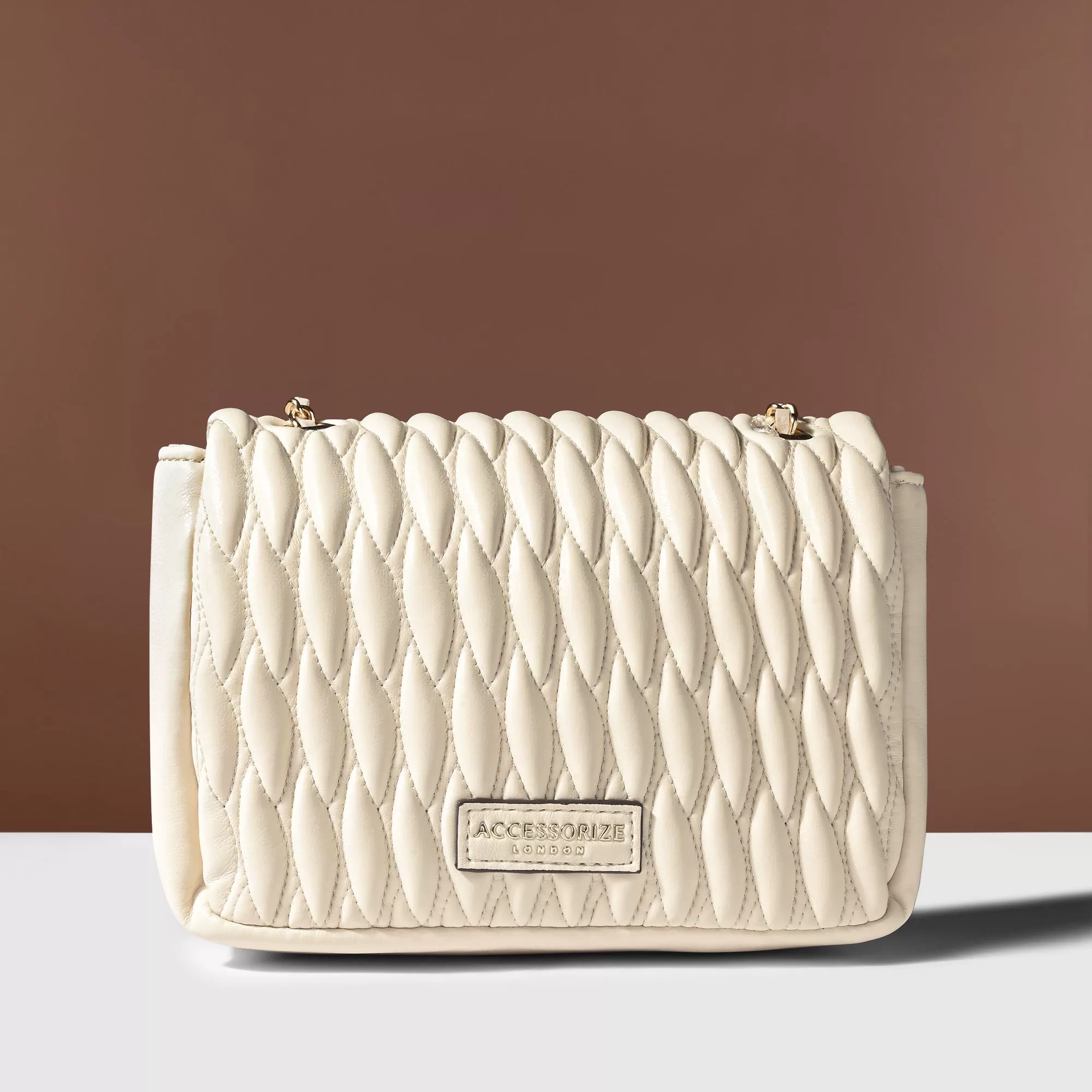 Accessorize London Women's Cream Quilted Sling Bag