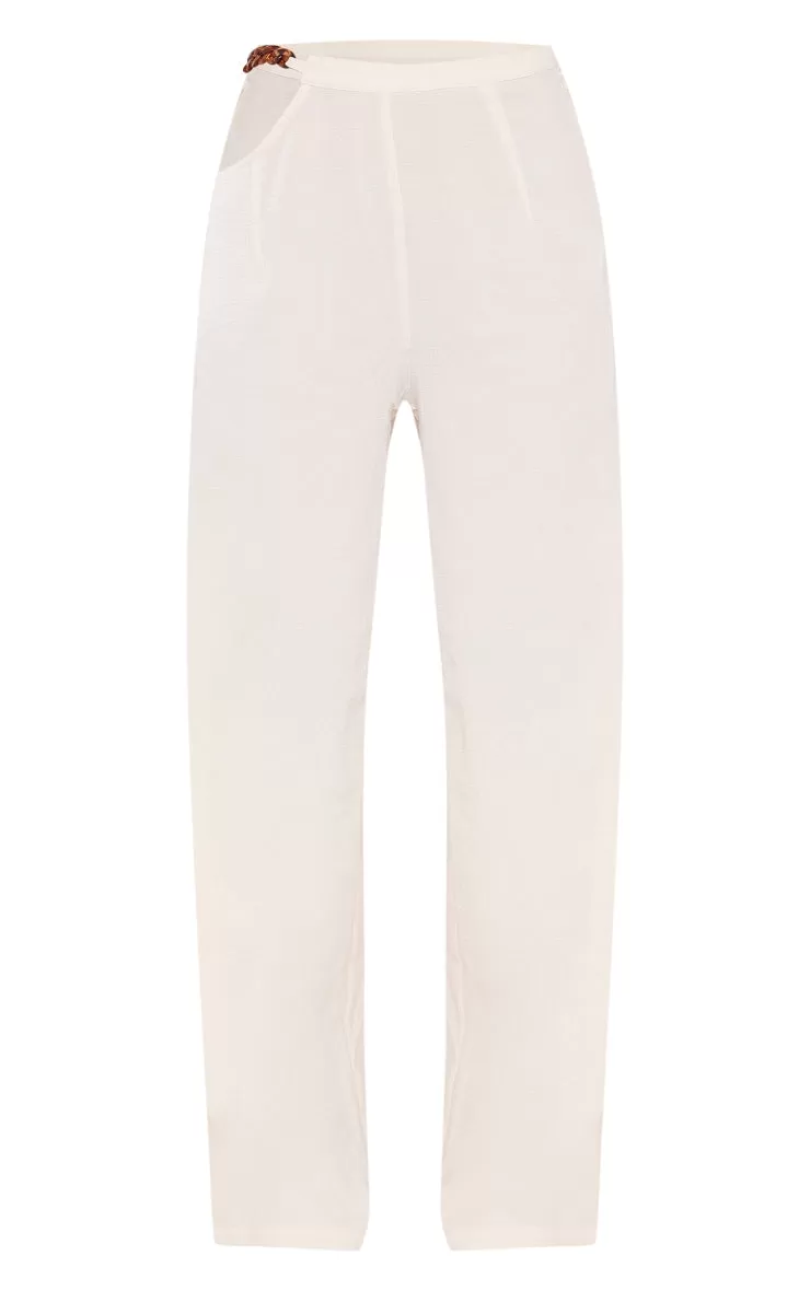 Beige crinkle chain trim straight leg trousers in beige